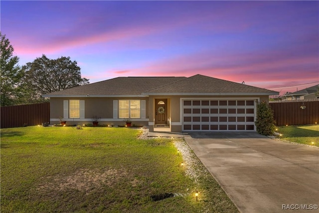 176 Juniper Loop Cir, Ocala, FL 34480 - single story home with a garage, concrete driveway, and stucco siding
