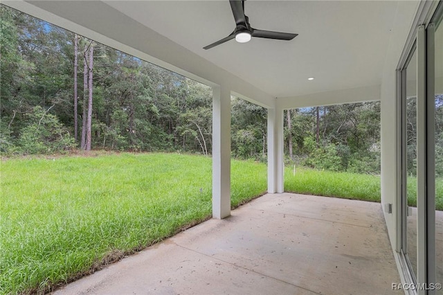 view of patio / terrace featuring ceiling fan