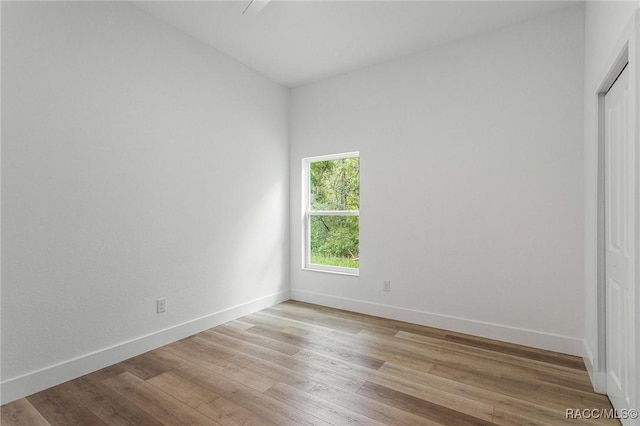 unfurnished room featuring light hardwood / wood-style floors