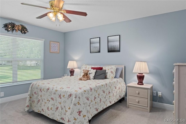 2880 N Folkestone Loop, Hernando, FL 34442 - carpeted bedroom featuring baseboards and ceiling fan