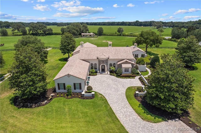 birds eye view of property featuring a rural view