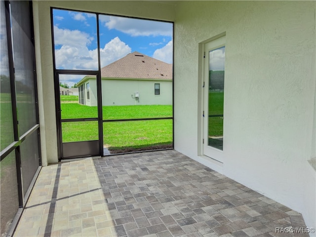 view of unfurnished sunroom