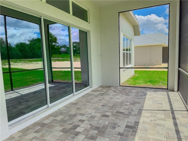 view of unfurnished sunroom