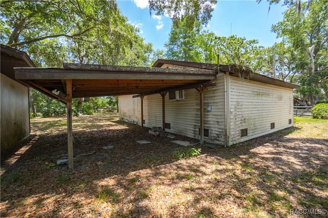 8915 E Echo Ct, Inverness, FL 34450 - view of side of home with a carport