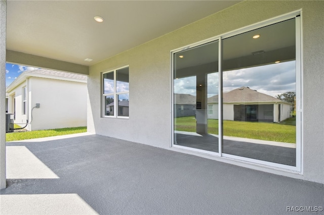 view of patio / terrace with central AC unit