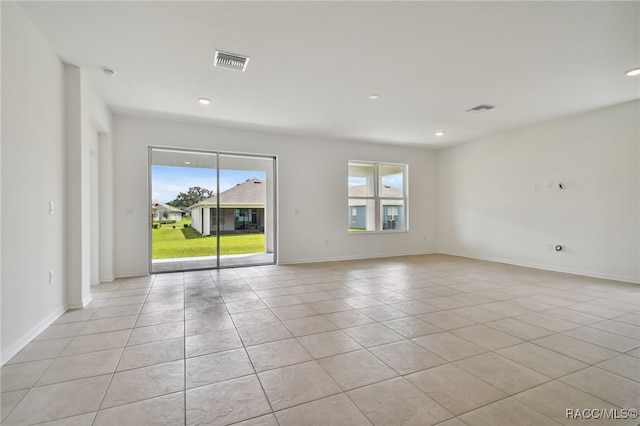 empty room featuring light tile patterned flooring