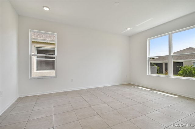 view of tiled spare room