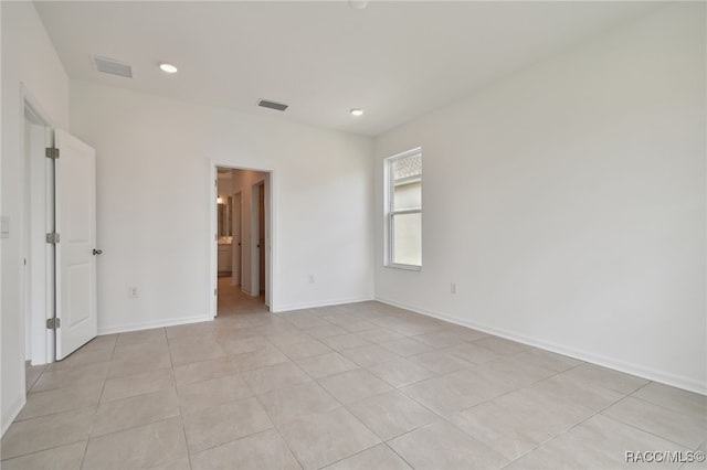 view of tiled spare room