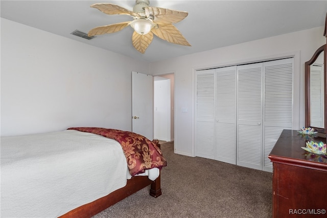 carpeted bedroom with a closet and ceiling fan