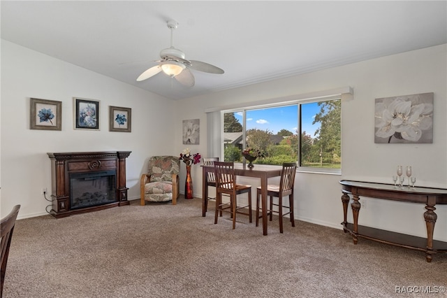 sitting room featuring carpet floors and ceiling fan