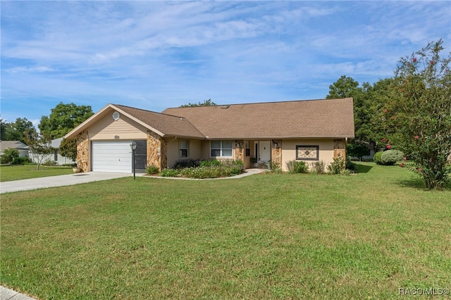 ranch-style house featuring a front yard and a garage