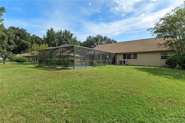 view of yard featuring a lanai