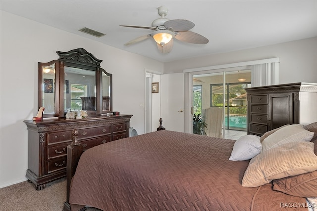 bedroom with ceiling fan, light carpet, and access to outside