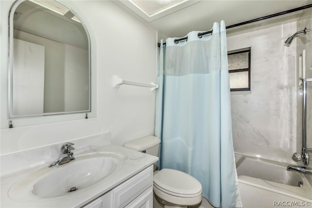 full bathroom with vanity, shower / bath combo, and toilet