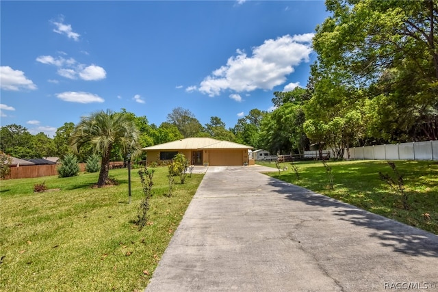 view of front of home featuring a front lawn