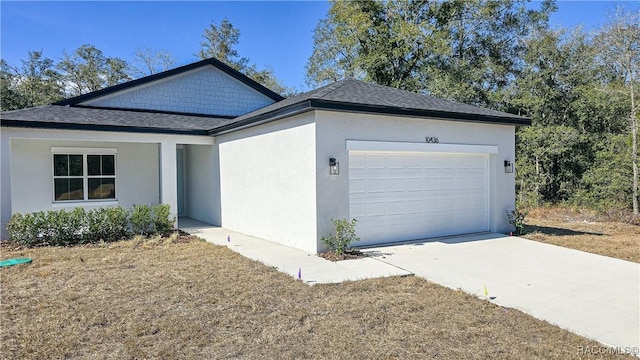 ranch-style home with a garage