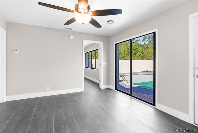 spare room featuring ceiling fan