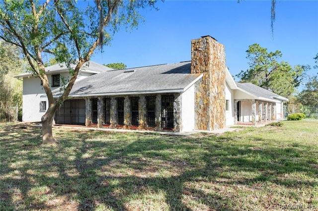 view of property exterior with a yard