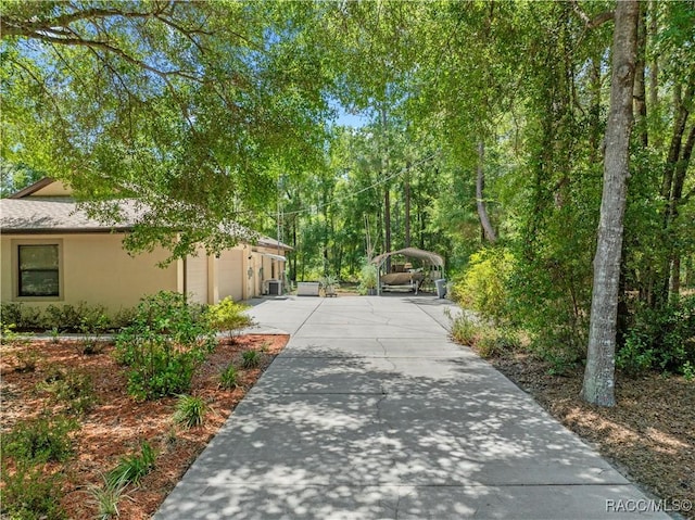 7634 N Hargrove Pt, Crystal River, FL 34428 - view of community with driveway and a garage