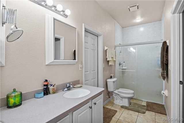 7634 N Hargrove Pt, Crystal River, FL 34428 - full bathroom with tile patterned floors, a stall shower, and vanity