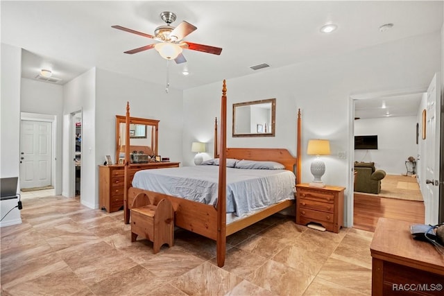 7634 N Hargrove Pt, Crystal River, FL 34428 - bedroom with a ceiling fan, a spacious closet, and recessed lighting