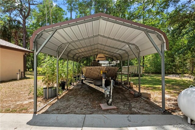 7634 N Hargrove Pt, Crystal River, FL 34428 - view of vehicle parking with a carport