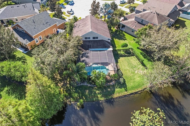 bird's eye view with a water view