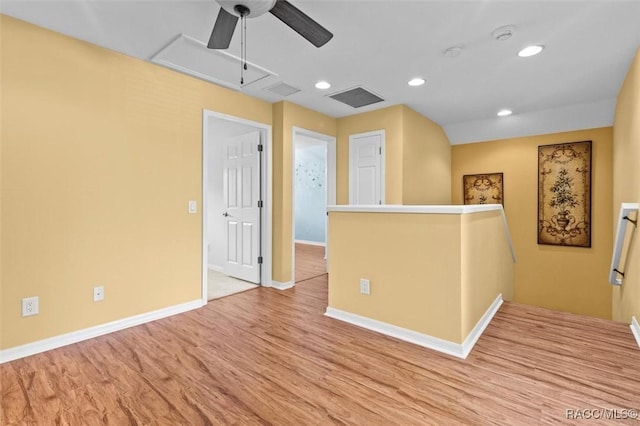 interior space with ceiling fan and light wood-type flooring