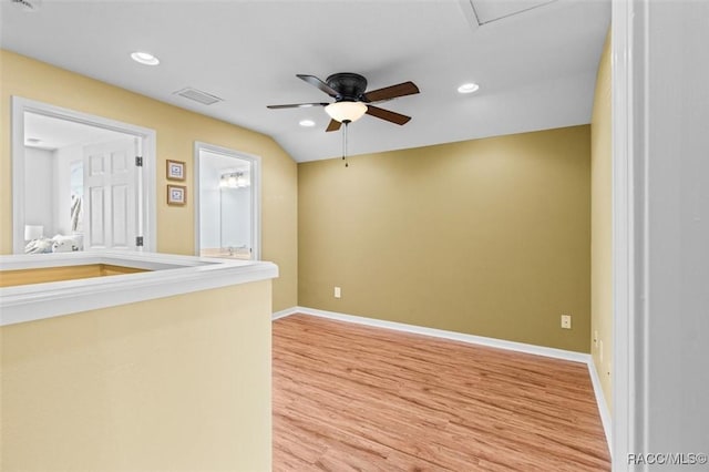 empty room with wood-type flooring and ceiling fan