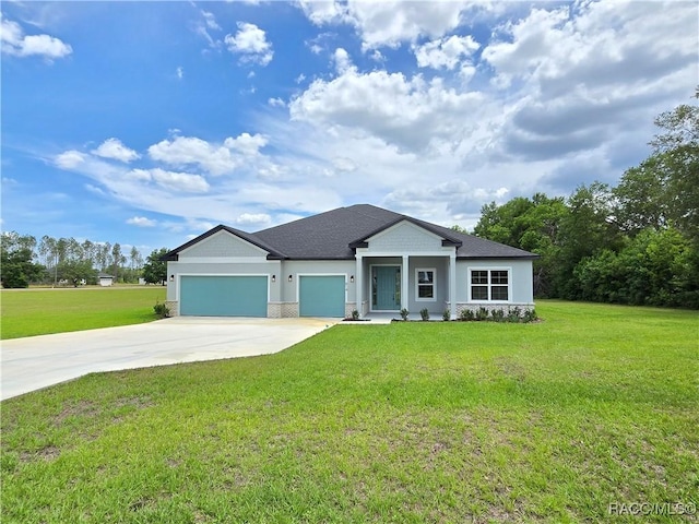 ranch-style house featuring roof with shingles, an attached garage, driveway, and a front yard