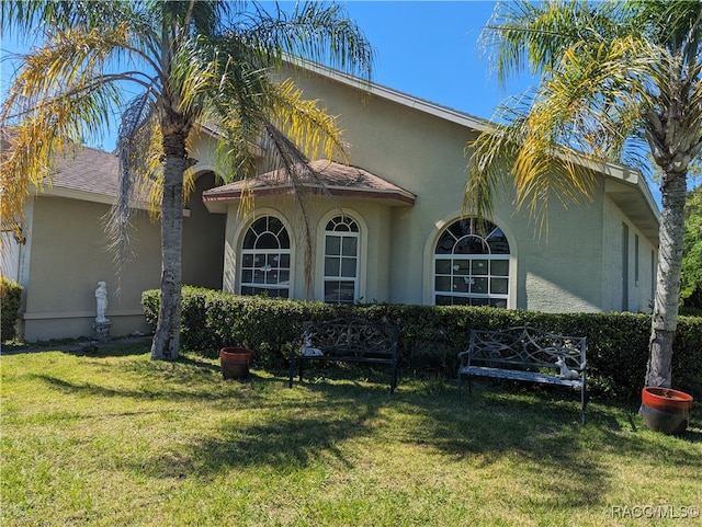 exterior space with a yard