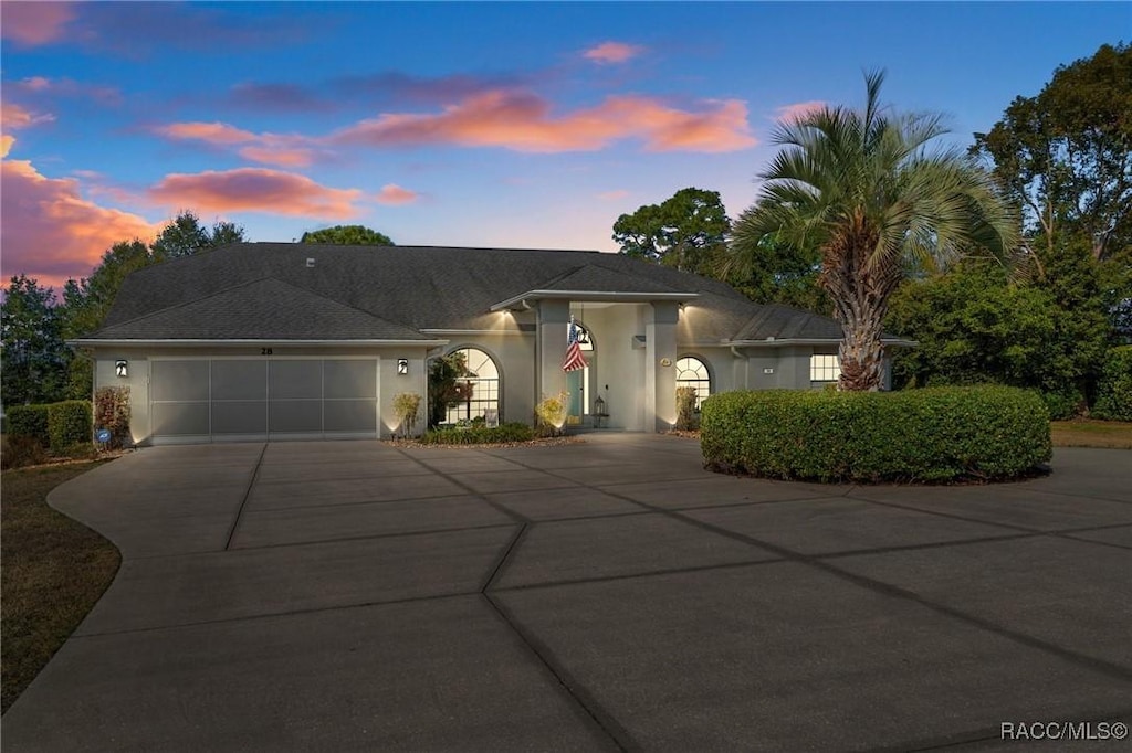 view of front of property featuring a garage