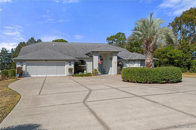 ranch-style home featuring a garage