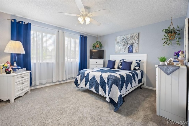 8849 SW 116th Place Rd, Ocala, FL 34481 - carpeted bedroom with a textured ceiling and a ceiling fan