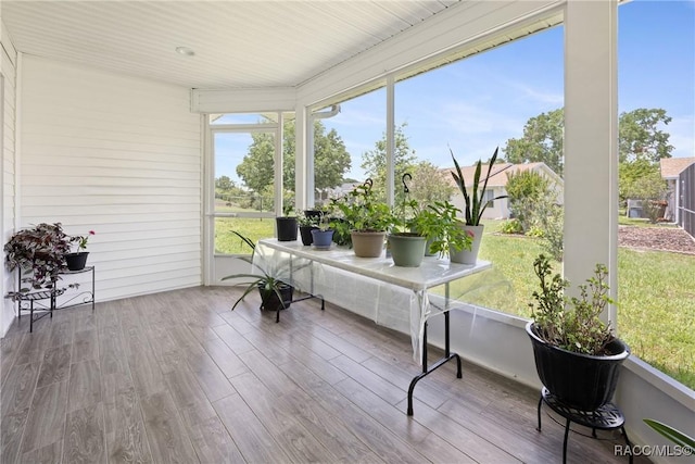 8849 SW 116th Place Rd, Ocala, FL 34481 - sunroom / solarium featuring wood finished floors