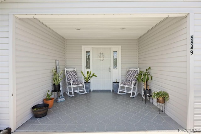 8849 SW 116th Place Rd, Ocala, FL 34481 - entrance to property featuring a porch