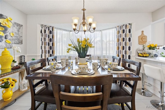 8849 SW 116th Place Rd, Ocala, FL 34481 - dining area with a chandelier and a textured ceiling