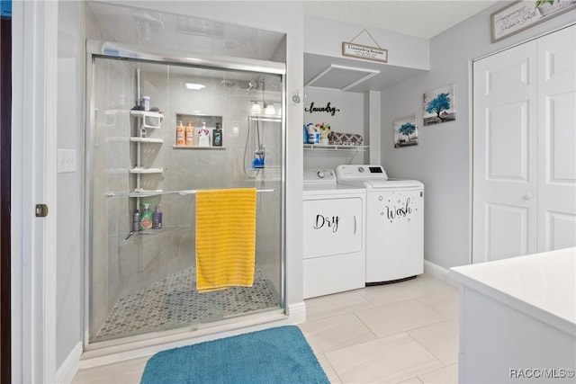 8849 SW 116th Place Rd, Ocala, FL 34481 - bathroom featuring washing machine and dryer, a shower stall, baseboards, vanity, and tile patterned flooring