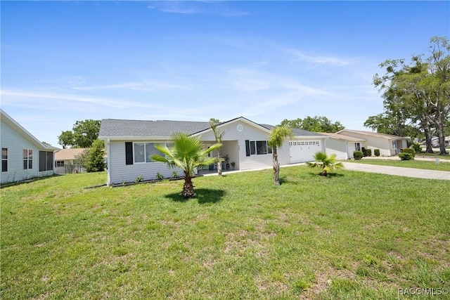 8849 SW 116th Place Rd, Ocala, FL 34481 - single story home featuring an attached garage, concrete driveway, and a front yard