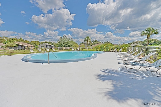 view of pool with a patio