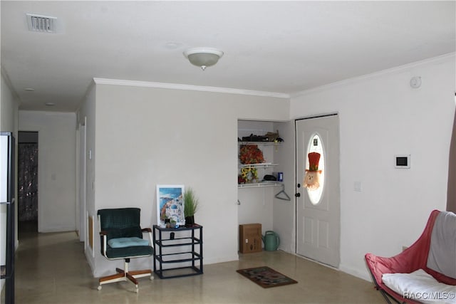 entrance foyer featuring ornamental molding