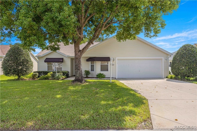 single story home featuring a front yard and a garage