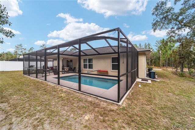 776 W Horizon Ln, Citrus Springs, FL 34434 - rear view of house with a patio and glass enclosure