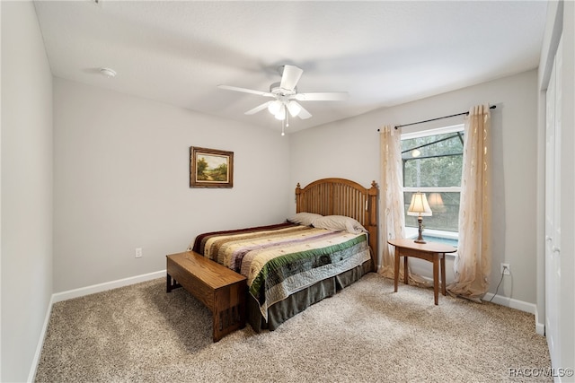 bedroom featuring ceiling fan, a closet, and carpet