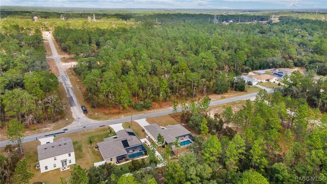 776 W Horizon Ln, Citrus Springs, FL 34434 - aerial view of property's location featuring a forest and nearby suburban area
