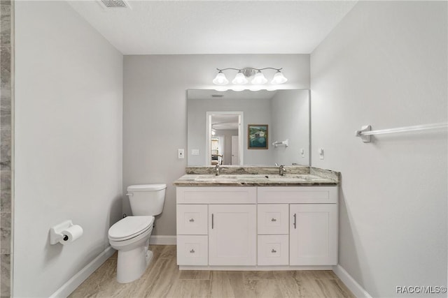 776 W Horizon Ln, Citrus Springs, FL 34434 - full bath featuring double vanity, toilet, and baseboards