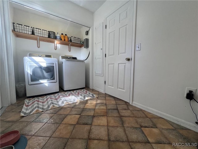 washroom featuring independent washer and dryer