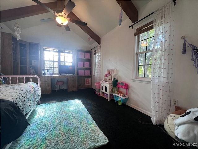 bedroom with ceiling fan, lofted ceiling with beams, and dark colored carpet