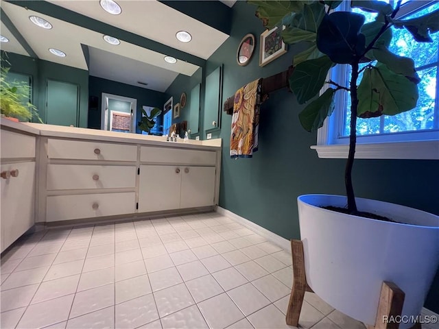 bathroom with vanity and tile patterned floors