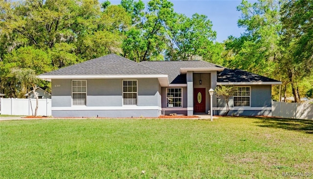 6355 E Anna Jo Dr, Inverness, FL 34452 - ranch-style home with stucco siding, fence, and a front lawn